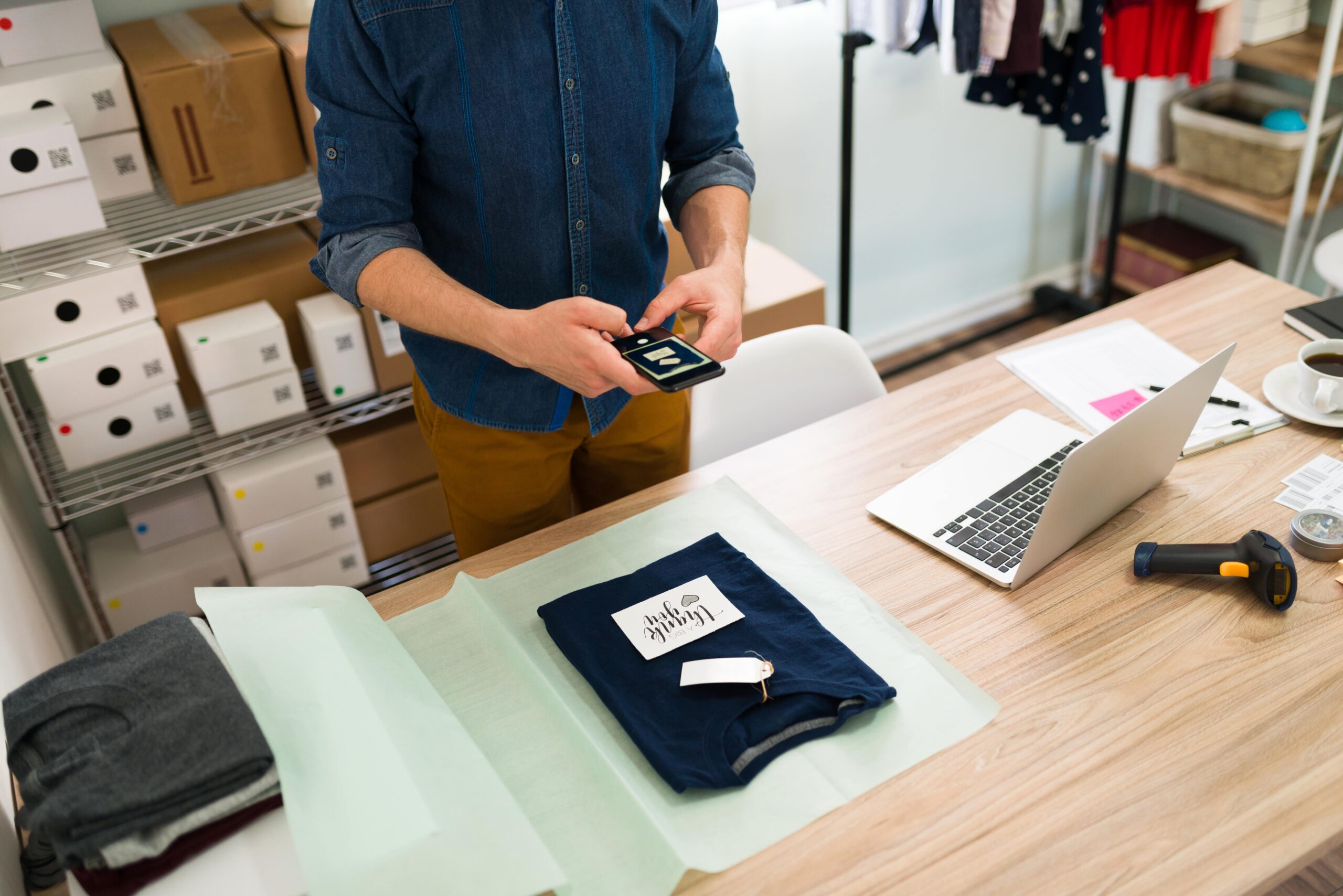 business social media young man taking picture thank you note package customer